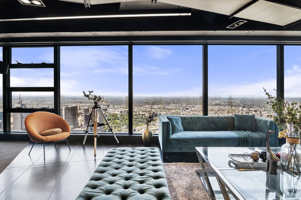 Lounge of one of the Melbourne short-stay apartments BNB Success runs, with skyline views